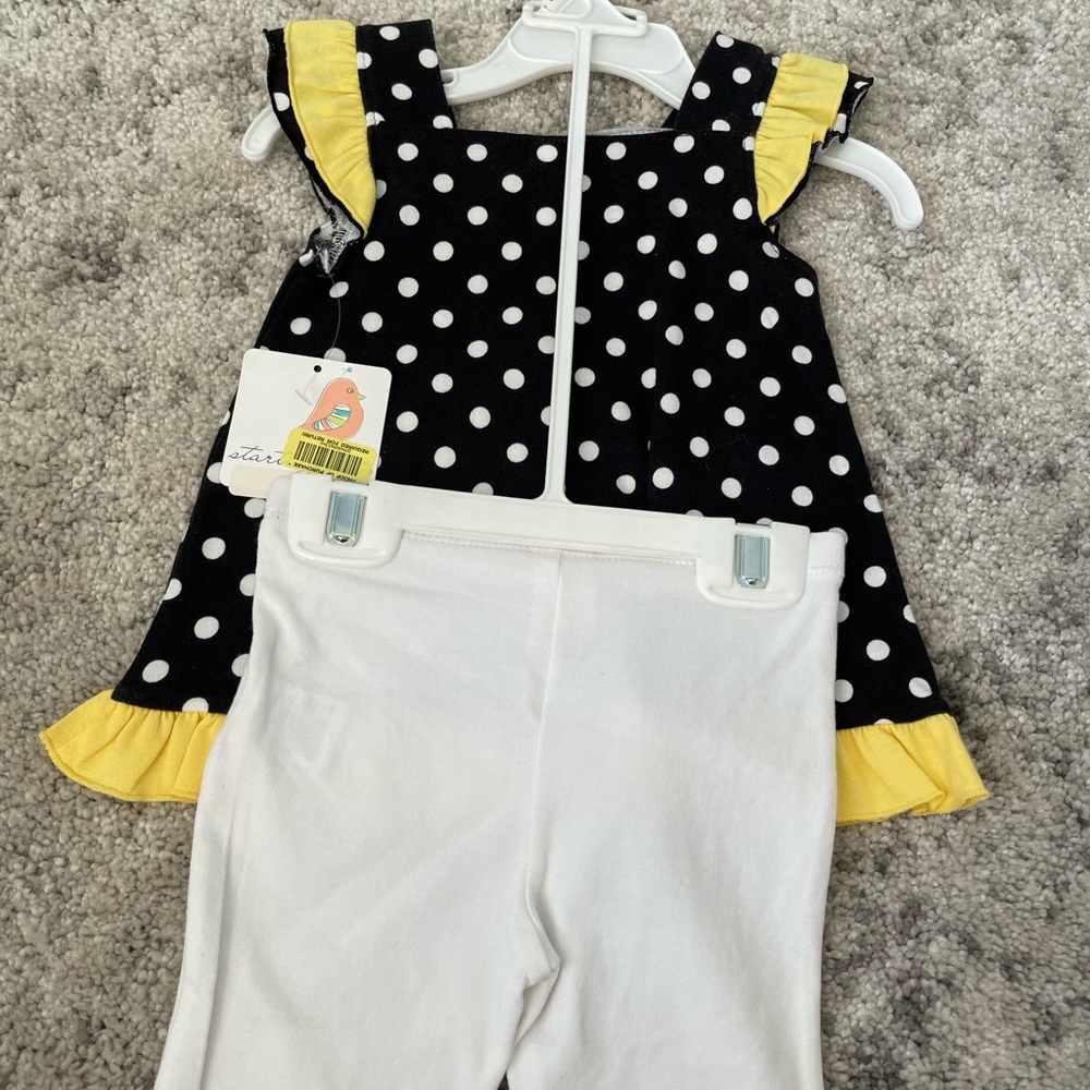 the color is black and yellow the size is on the picture but brand new